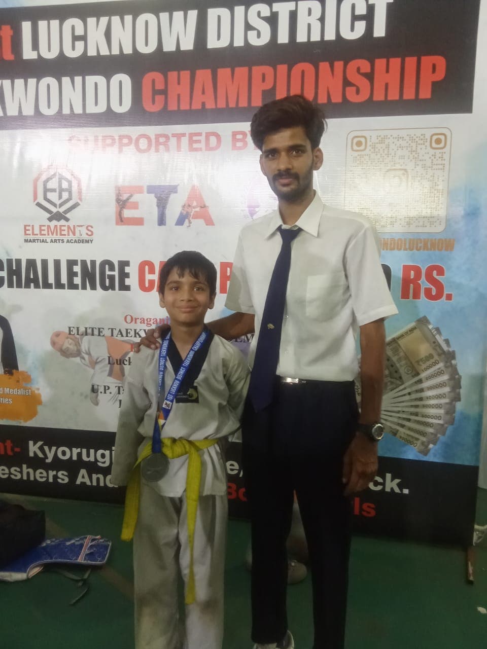 Young Martial Mystery Dojo student wearing medal at 1st Lucknow District Taekwondo Championship
